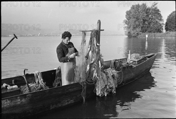 Professional fisherman at work on Lake Zurich 1971