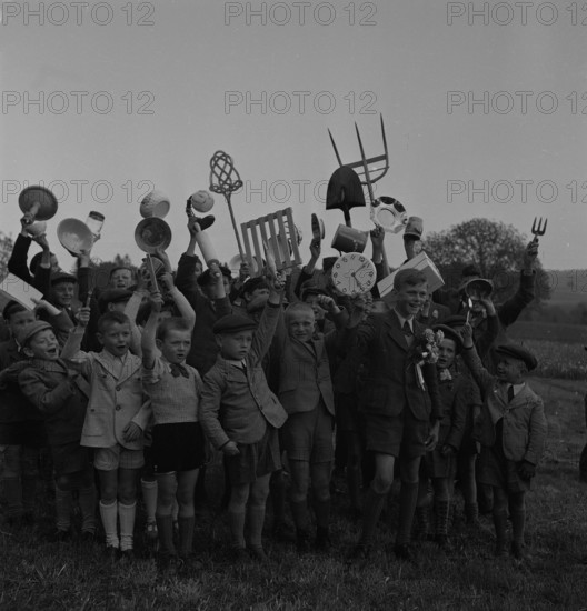 Boys with household items, 1944