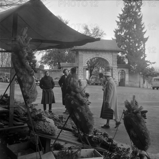 Wreath sale outside the cemetery in Zurich, 1953