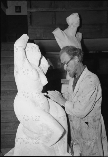 Sculptor working in artists home Riesbach, Zurich 1950