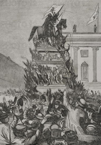 Franco-Prussian War (1870-1871). Berlin, 3 September 1870. The monument to Frederick the Great crowded with people celebrating the German victory over the French at the Battle of Sedan (1-2 September 1870). Engraving. ""Historia de la Guerra de Francia y Prusia"" (History of the War between France and Prussia). Volume I. Published in Barcelona, 1870.