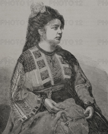Romanian woman wearing traditional costume. Engraving by Richard Brend'amour. ""La Guerra de Oriente"" (The Russo-Turkish War). Volume I. 1877.