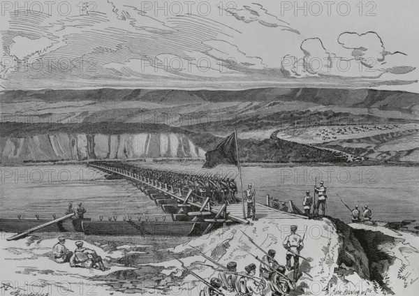 Russo-Turkish War (1877-1878). Crossing the Danube by the Russian troops. Bridge of Simnitza, June 26, 1877. Two bridges supported on trestles were laid over the lagoons. Engraving by A. Ferdinandus and Roch Regnier et Cie. ""La Guerra de Oriente"" (The Russo-Turkish War). Volume I. 1877.