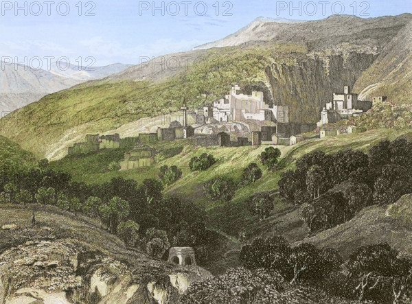 Nazareth. General view of the city. Engraving by Aubert. Later colouration. ""La Tierra Santa y los lugares recorridos por los profetas, por los apostoles y por los cruzados"" (The Holy Land and the sites traversed by the prophets, by the apostles and by the crusaders). Published in Barcelona by the printing house of Joaquin Verdaguer, 1840.