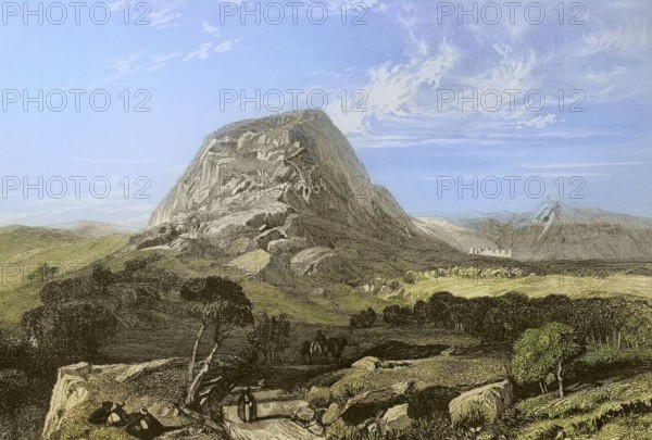 Mount Tabor. Lower Galilee. Engraving by Emile Rouargue. Later colouration. ""La Tierra Santa y los lugares recorridos por los profetas, por los apostoles y por los cruzados"" (The Holy Land and the sites traversed by the prophets, by the apostles and by the crusaders). Published in Barcelona by the printing house of Joaquin Verdaguer, 1840.
