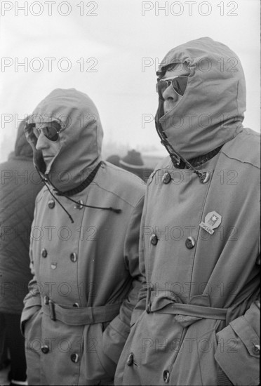 Olympic Games Grenoble 1968: Spectators watching ski racer