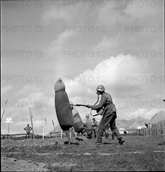 Federal Day celebration; soldiers demonstrate their military capability; 1940