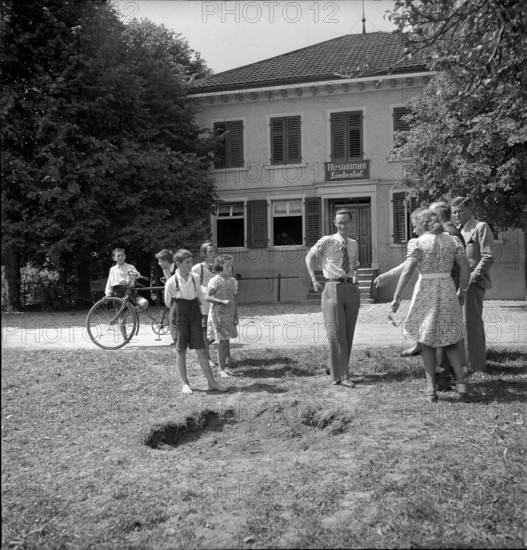 WWII: Bombing in Switzerland; impact, crater, 1943
