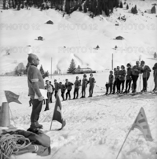 Demonstration skiing by local ski instructors in Adelboden, 1965