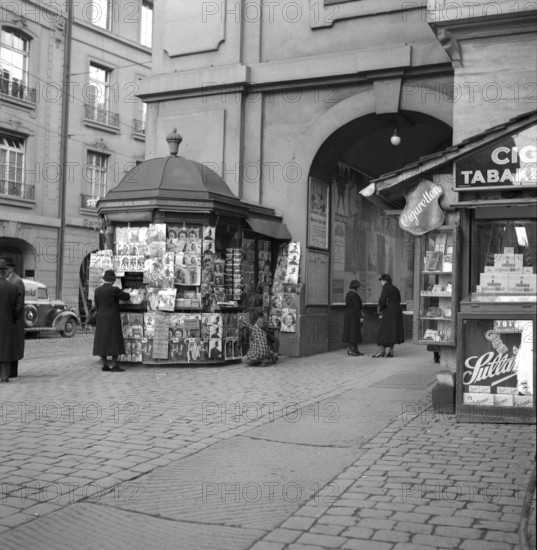 Newsstand, newspaper display, 1940