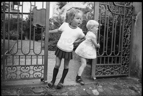 Children in front of a park entrance, 1969