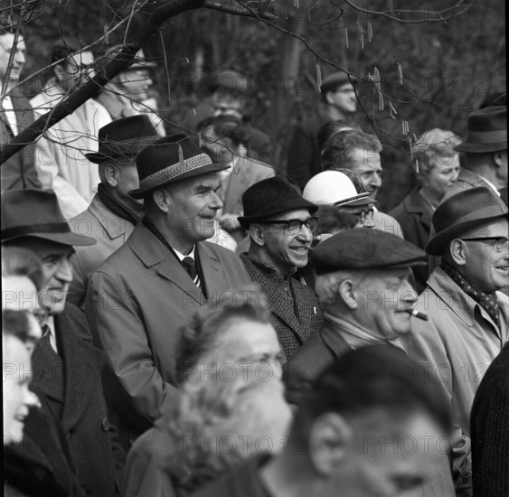 Onlookers at the demolition of a high chimney, Winterthur 1965