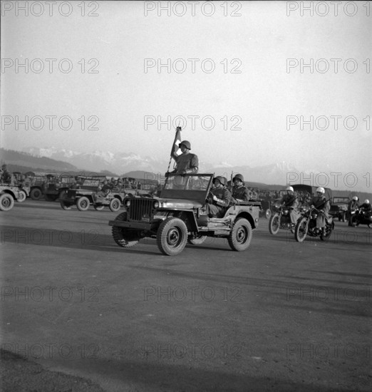 Flag bearer on Jeep, Emmen 1949