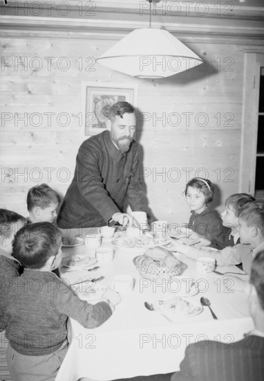 At the dining table, Pestalozzi Children's Village Trogen 1946