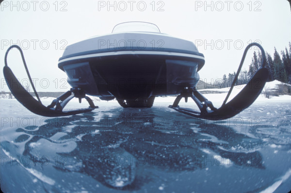 By snowmobile through the Canadian winter landscape 1982