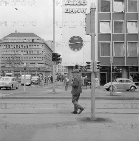 Pedestrians in front of Ako Bank in Zurich, 1956