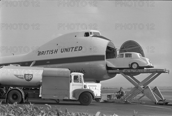 Rolls Royce being loaded onto an airplane, 1966