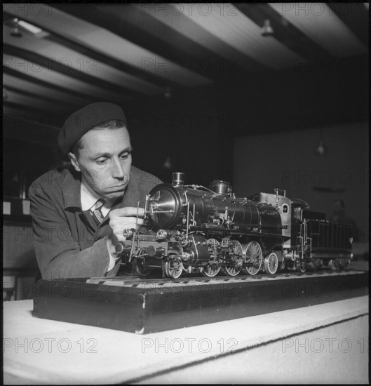 Man with Model of Locomotive