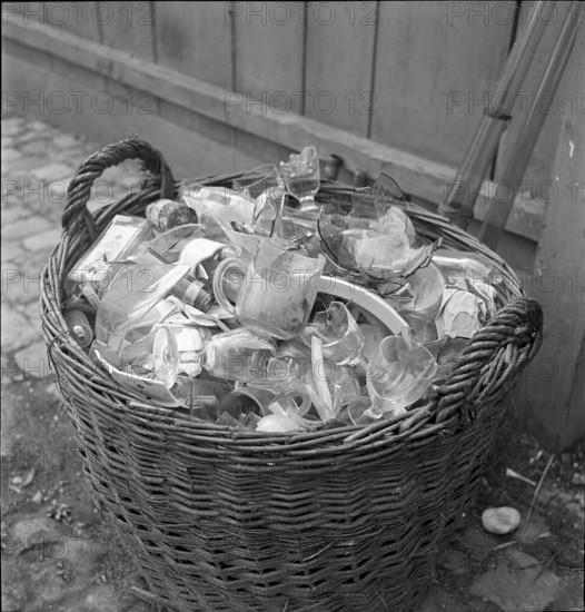 Basket full of used glass. 1942