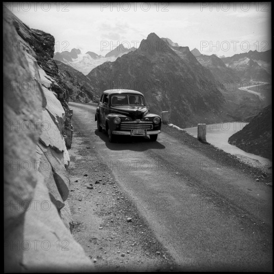 Car on the access to Oberaar building site 1950