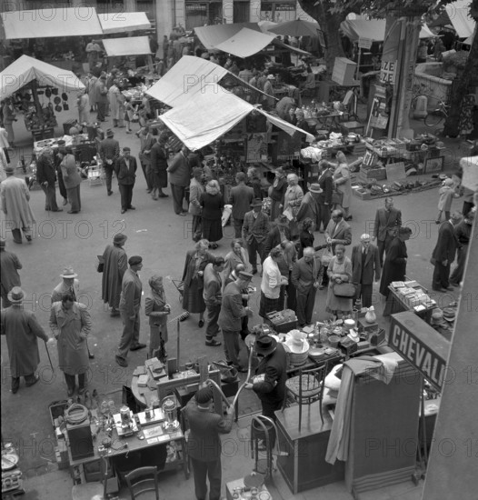 Woman and man spinning and carding wool, 1945