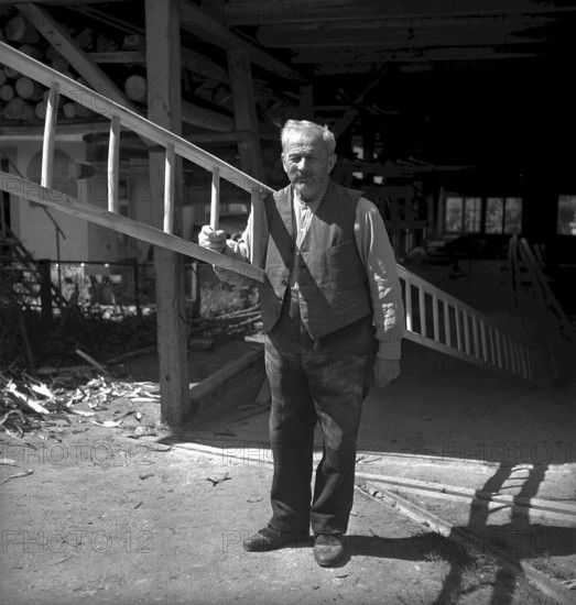 Herznach mine, worker at the silo. 1952