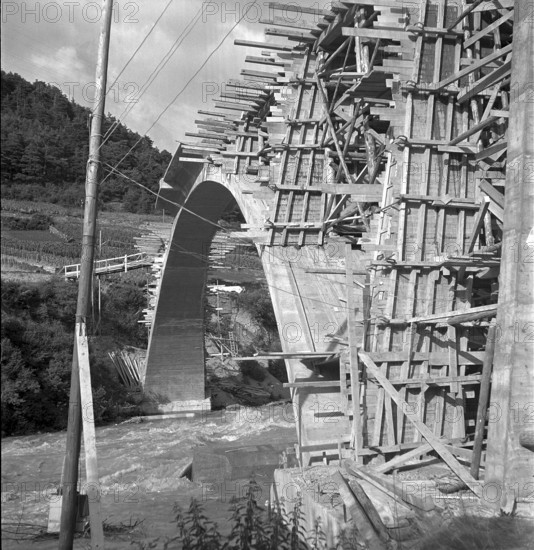 men looking at Avalanche in the Lötschen valley. 1951