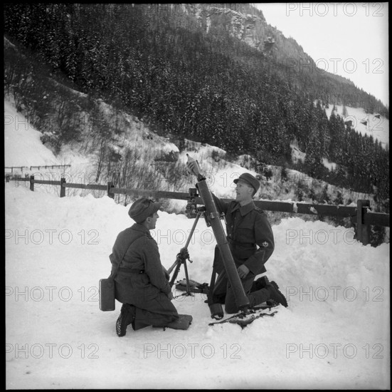 Avalanche in Vals, boys carrying parcels with solidarity donations. 1951