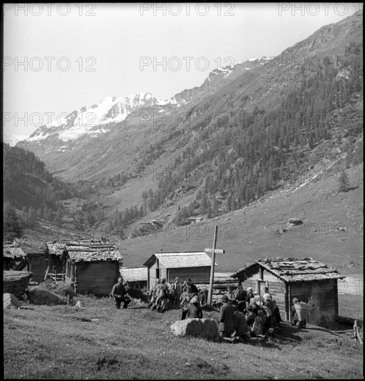 Farmers in the Turtmann Valley meet to donate cheese, 1940