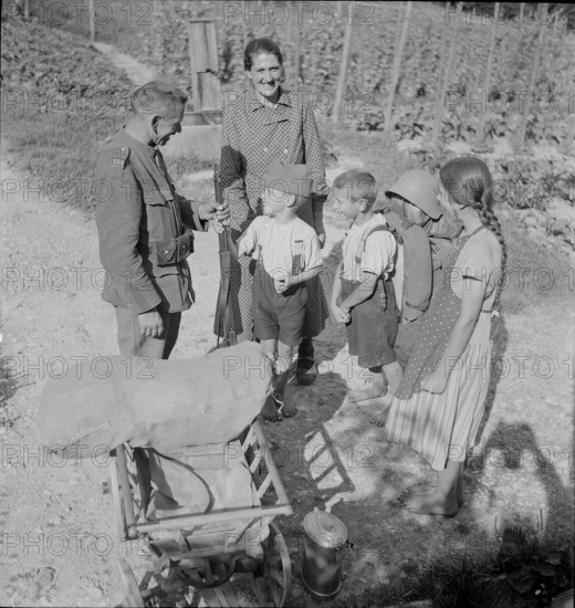 Soldier, returning home after discharge; 1940; 1940