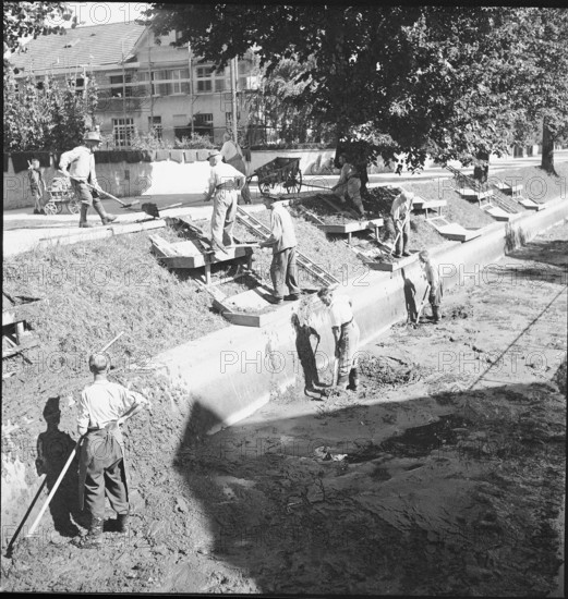 Stream bed is cleaned of mud, Aarau 1944