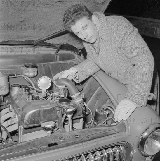 Inventor with gaspowered car, 1956