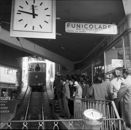 Tourists taking pictures in Lugano, 1961