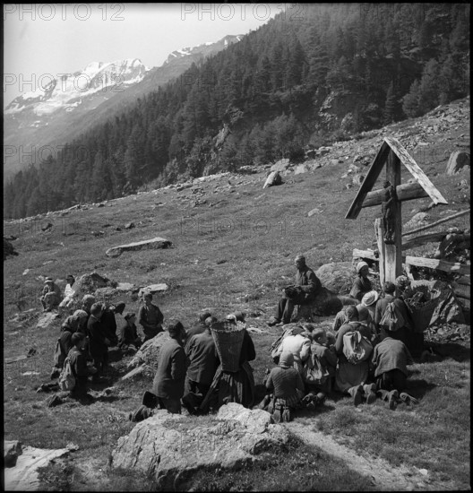 Farmers praying in the Turtmanntal valley, Switzerland, 1940.