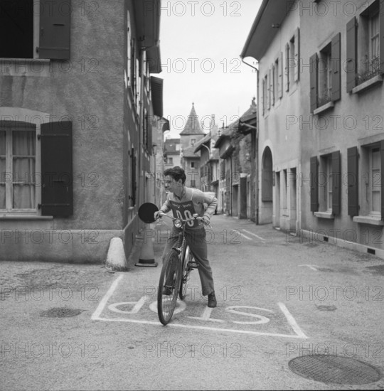 Compulsory bike riding test in Lausanne, 1956.