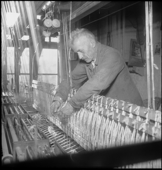 Silk ribbon weaver working, 1948.