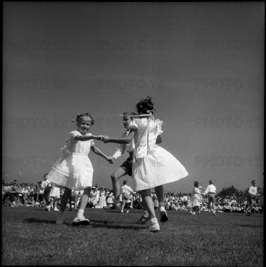 Children dancing at the children's party in St. Gallen, 1955.
