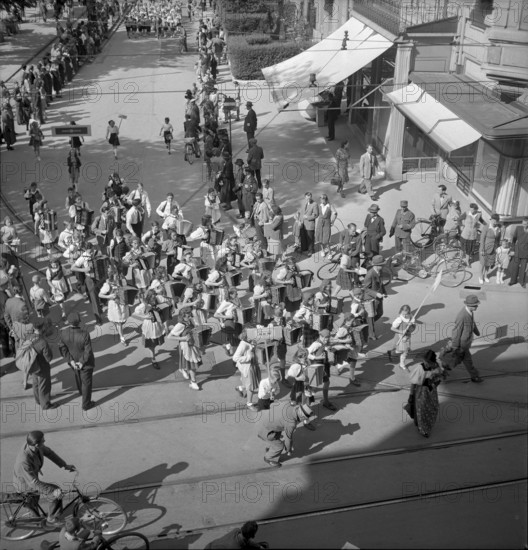 Swiss donation: Procession of accordionists, 1945.