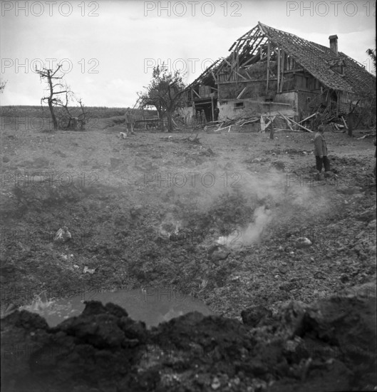 WW 2: bombing in Switzerland; bomb airdrop, dropping in Riggisberg, 1943.