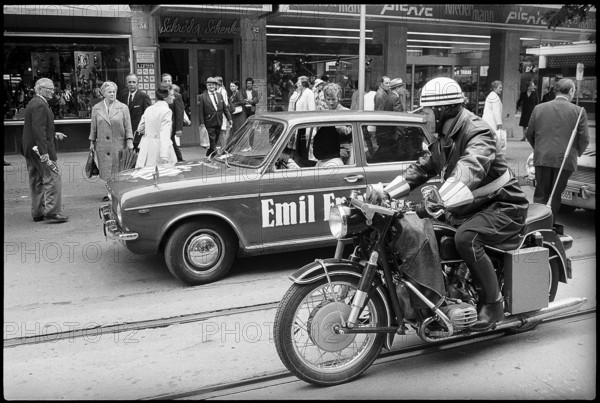 Motorcycle policeman escorting Werner Hornung, magician on blind drive 1970.