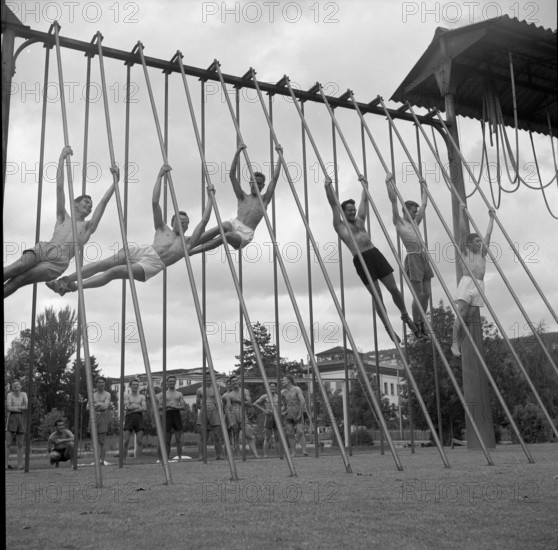 Boys at  climbing poles, Oberseminar Zurich 1957.