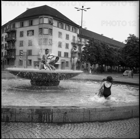 Children playing in a fountain in Zurich, 1967.