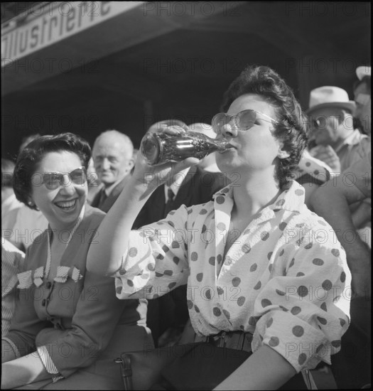 Football WC in Switzerland 1954: Spectator having Coca Cola.