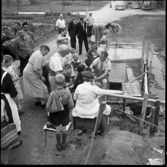 People enjoy Zurzach thermal spring; 1955.