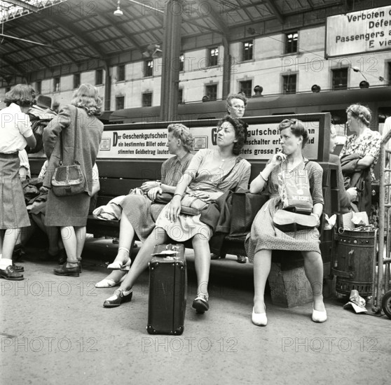 Railway passengers waiting at the station, Basel 1947.