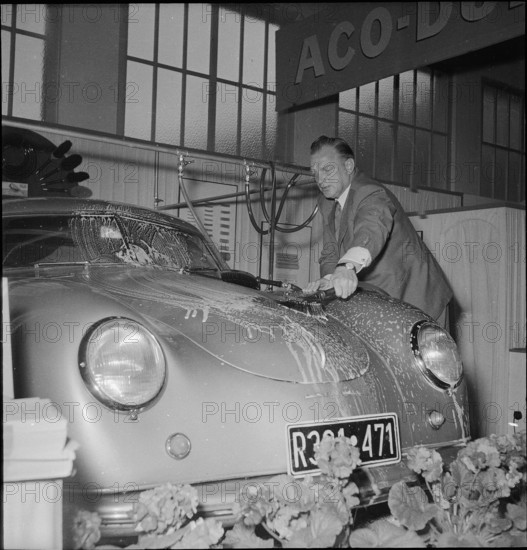 man washing car.