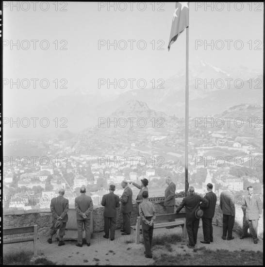 Federal councillors, viewpoint upside Sion, Valais; 1957.