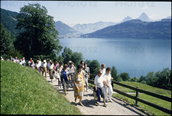 Women and men on the 'Weg der Schweiz' 1991.
