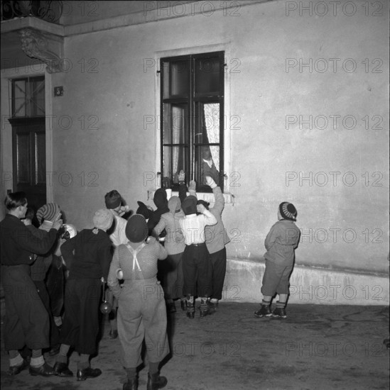 Children celebrating the end of the school semester in 1950.