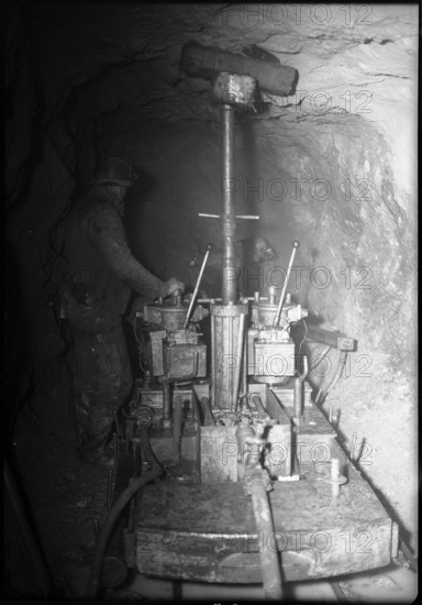 Maintenance work in a tunnel, Barberine power statin 1950.